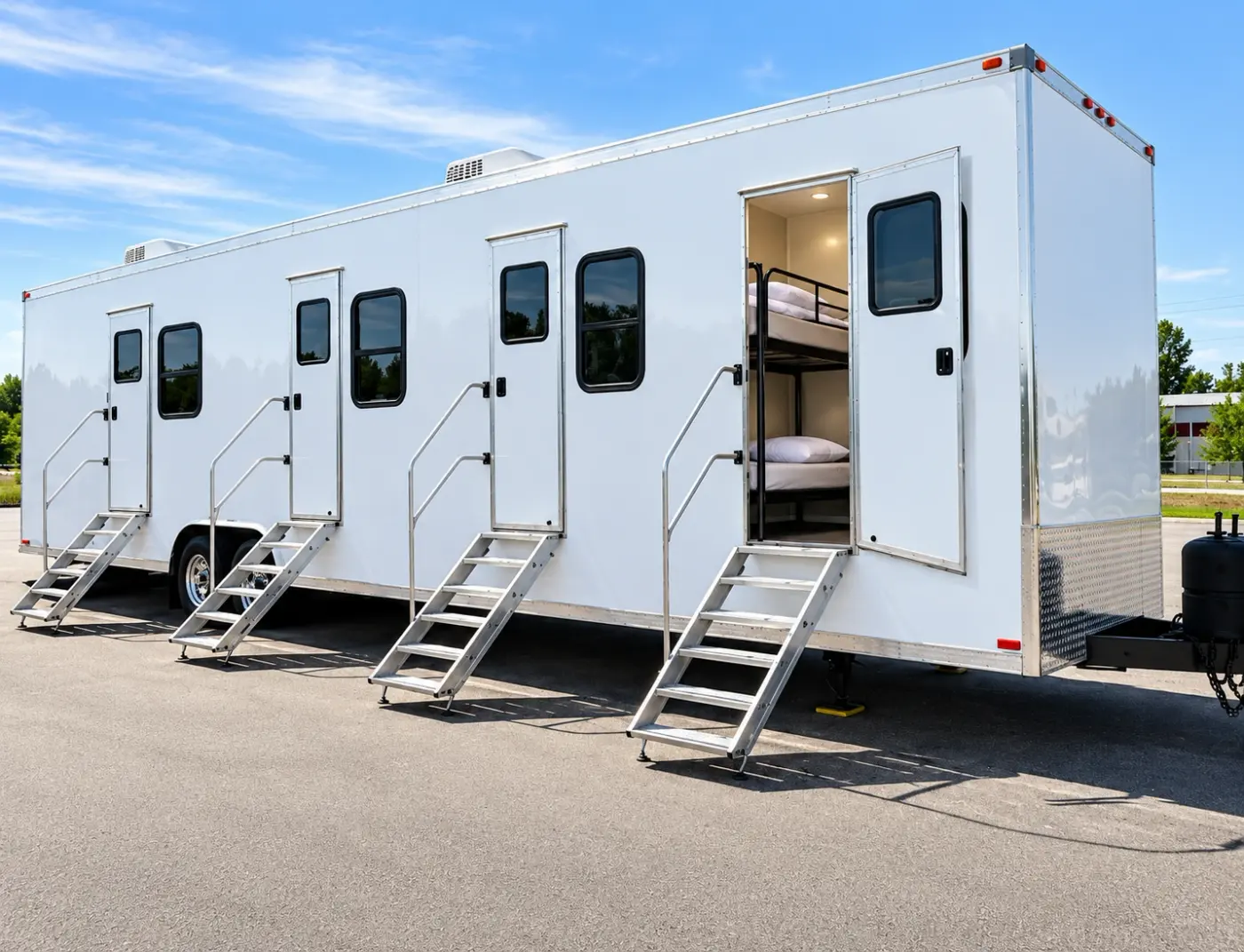 Exterior of a 20ft accommodation trailer with entry steps
