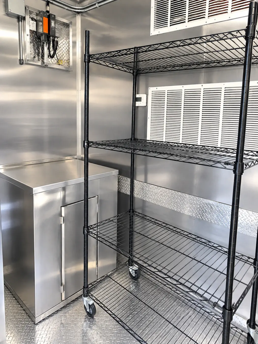 Interior aisle of a 26ft baby bulk kitchen trailer