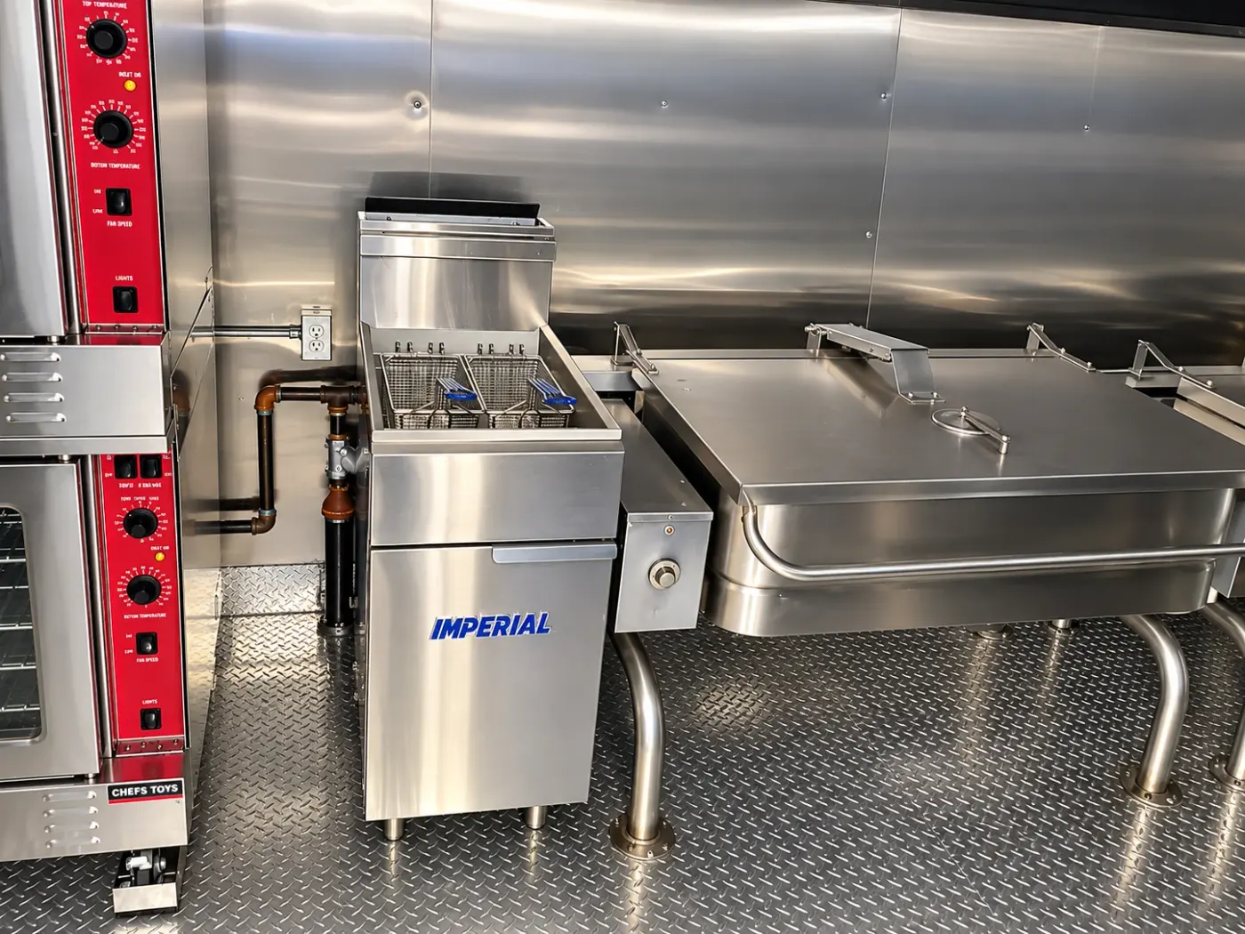 Deep fryer and tilting skillet in a 40ft bulk combo kitchen