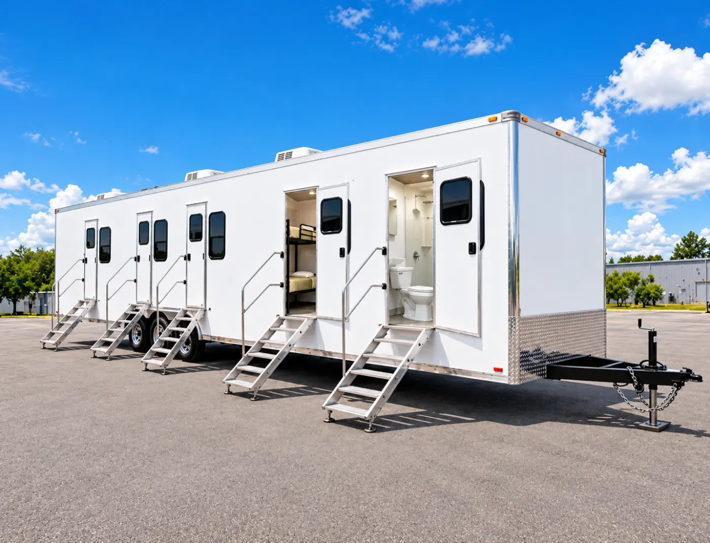 Exterior of a long office, sleeper, shower and restroom trailer with entry steps