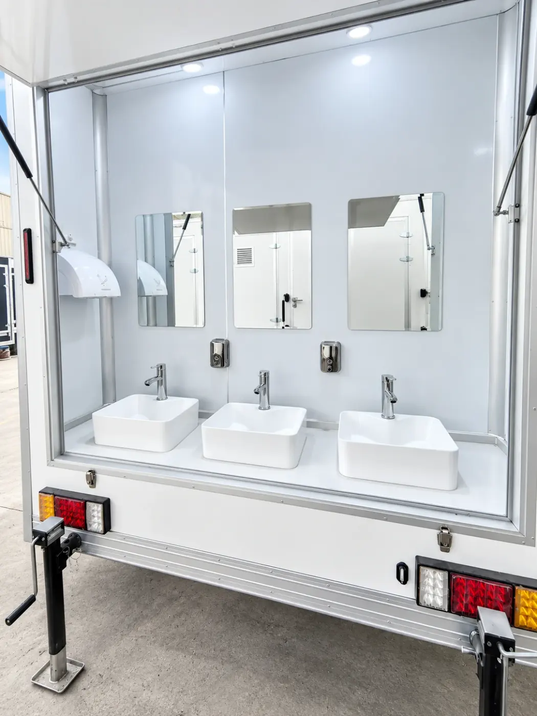 Sink and mirror area of a 20ft shower trailer