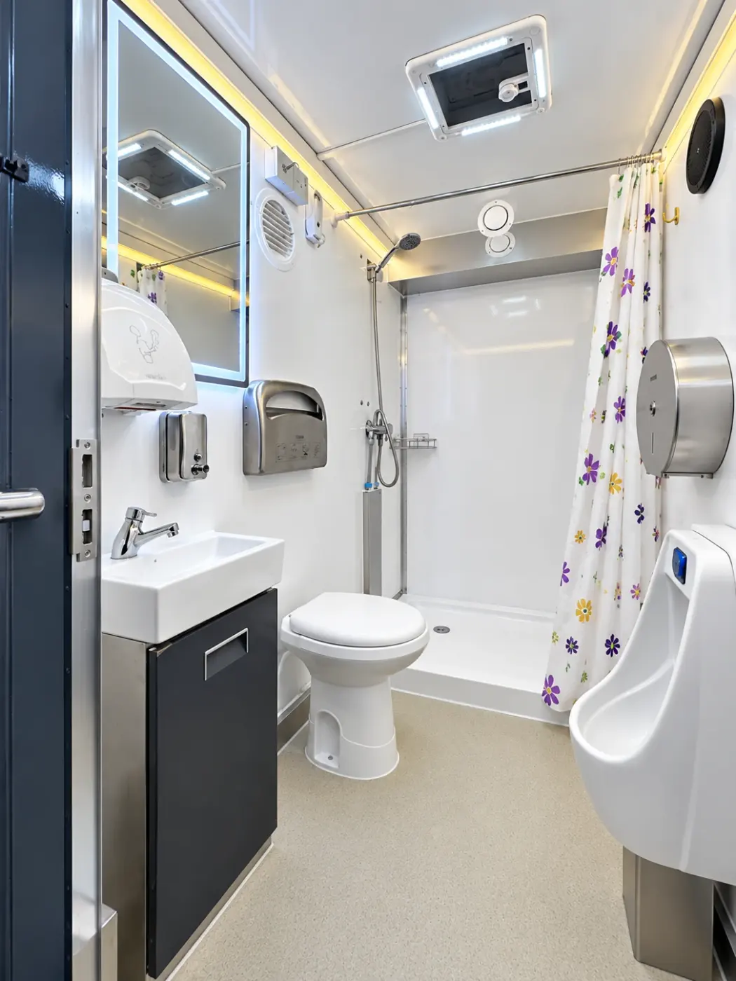 Shower stall inside a shower and restroom trailer